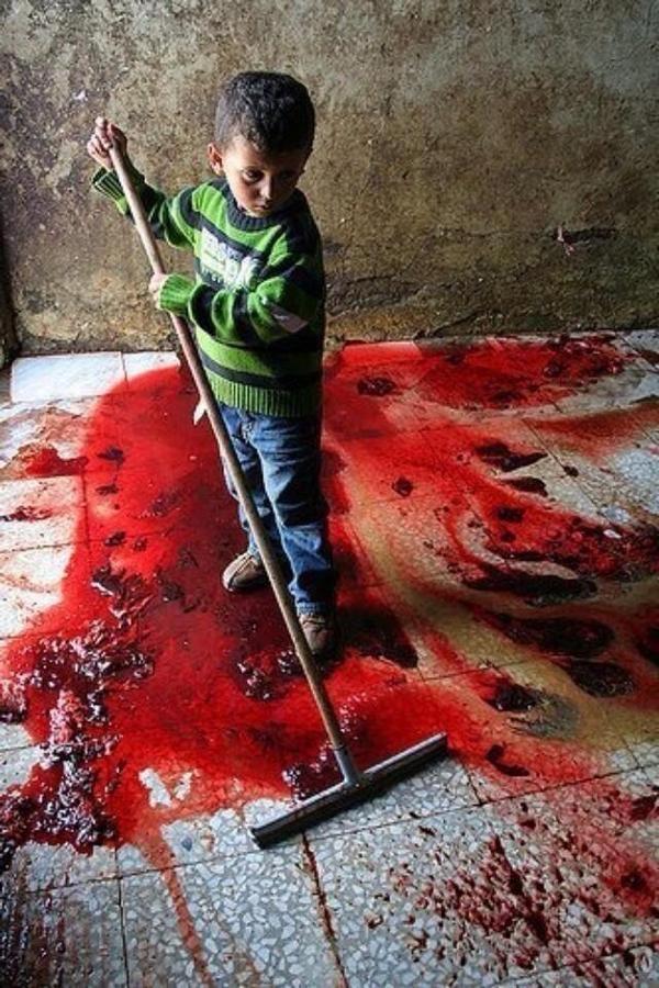 Child cleaning house full of blood