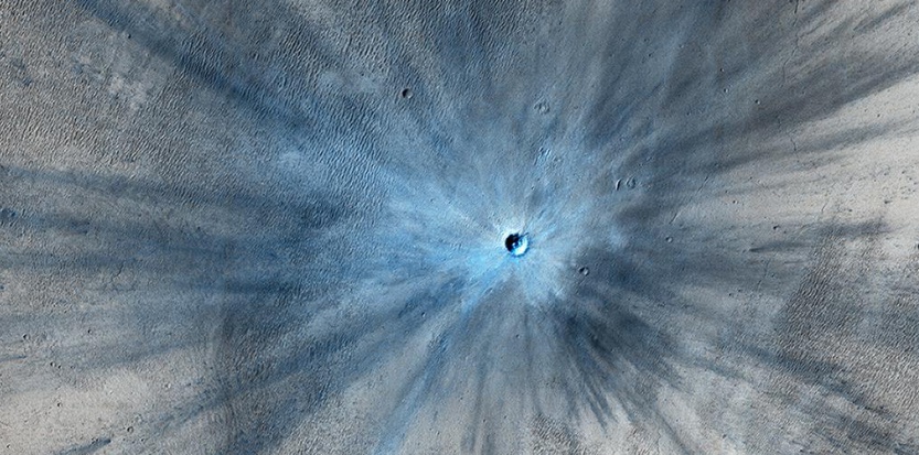 Un cratère sur Mars, révélé par la sonde Mars Reconnaissance Orbiter. Nasa/JPL-Catech/Univ. of Arizona