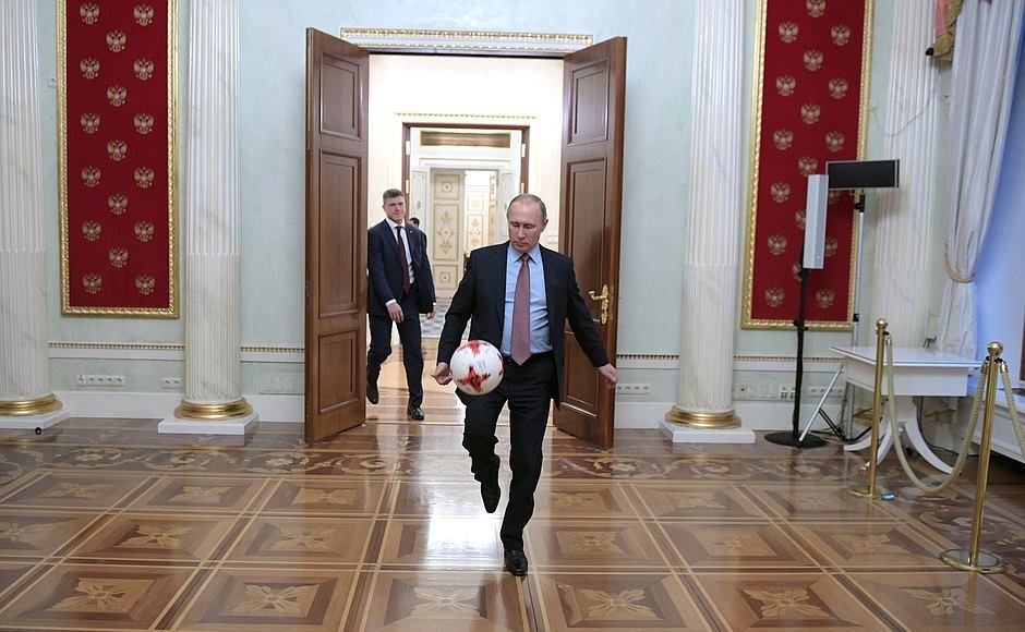 Putin kicks the ball