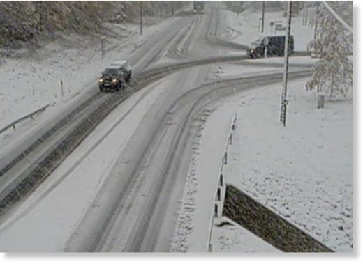 Snowy road conditions captured on traffic camera at Heinävaara, Route 74, 4th October 2019