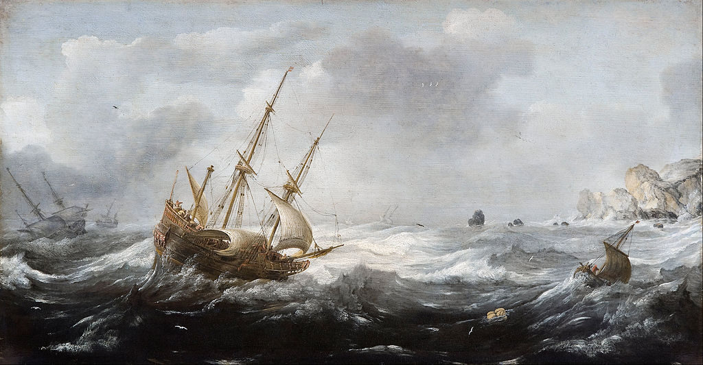 Des navires dans une tempête sur une côte rocheuse