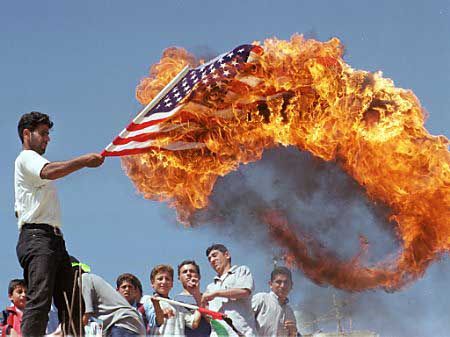 People burning US Flag