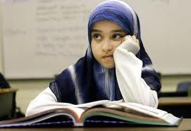 Young muslim girl at school