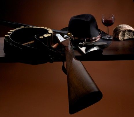 Fusil et vin rouge